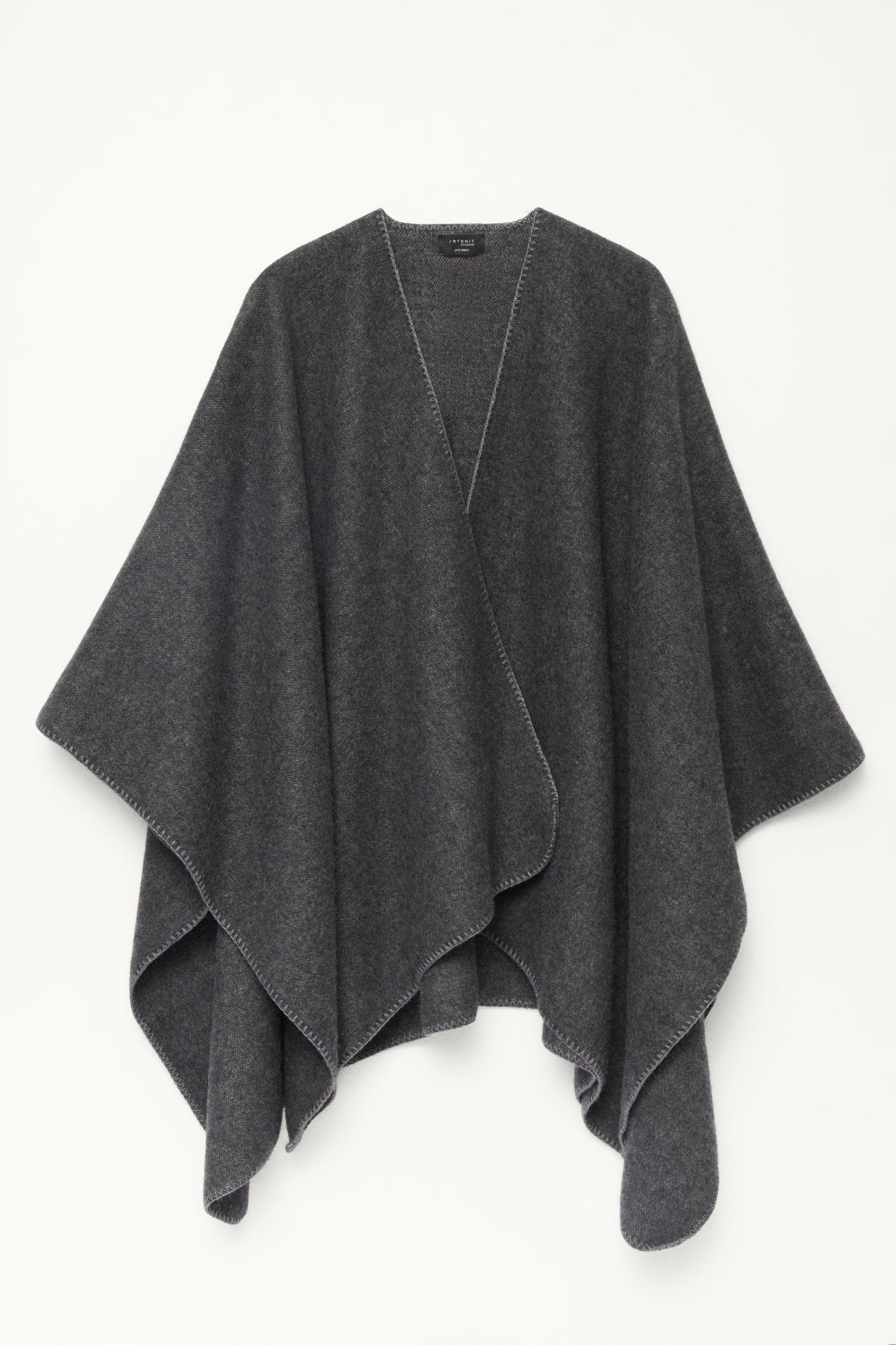 Gray poncho on a white background