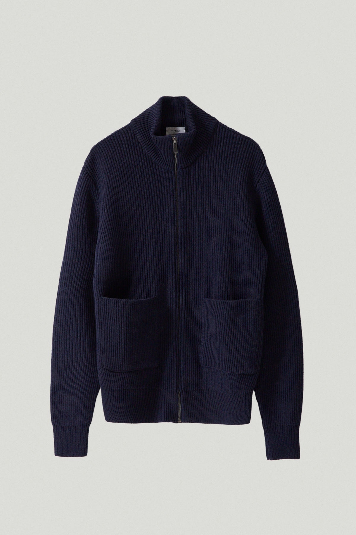 Die Merinowolle mit Strickjacke mit Reißverschluss versehen
