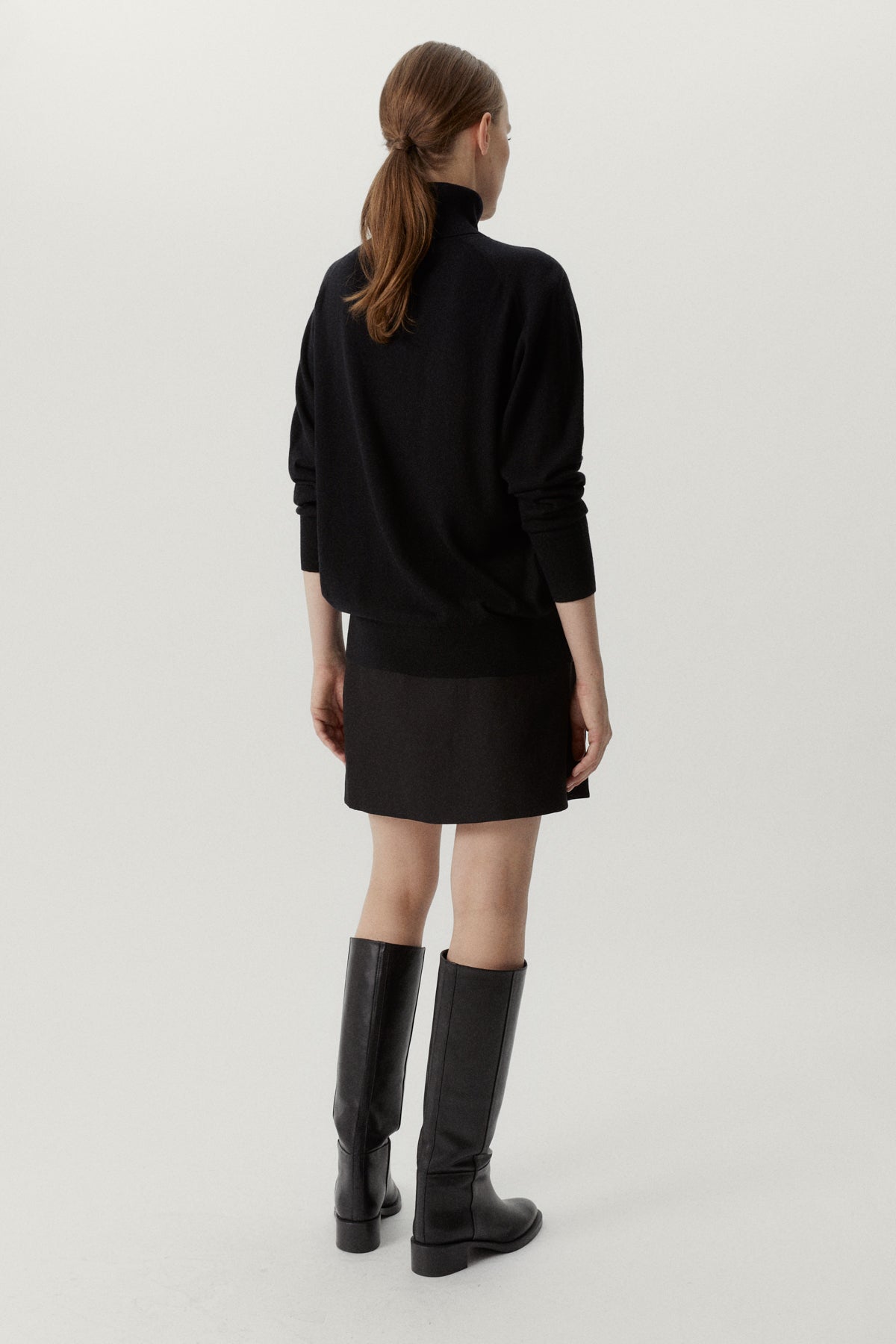 the ultrasoft wool relaxed roll neck black