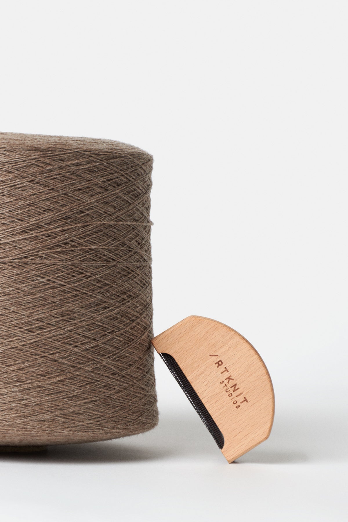 Pettinino in legno anti-pilling