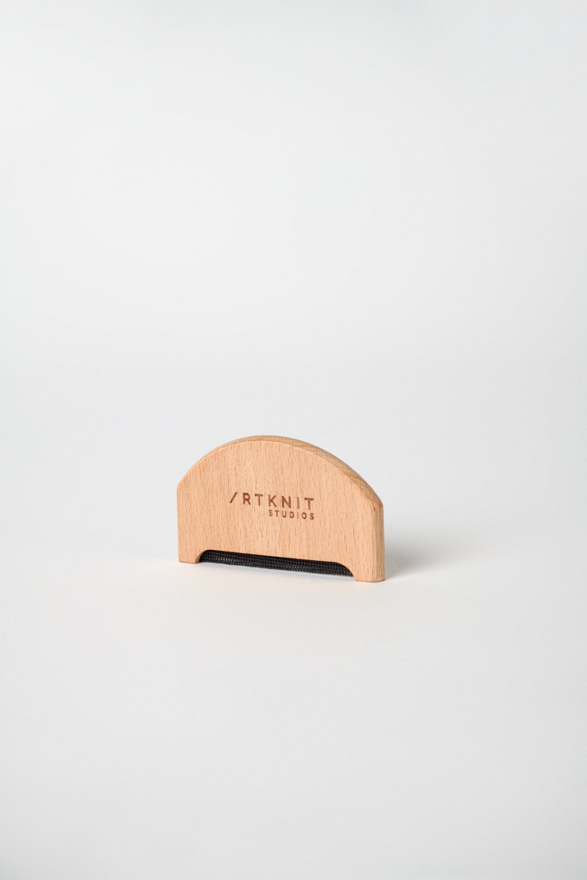 Pettinino in legno anti-pilling