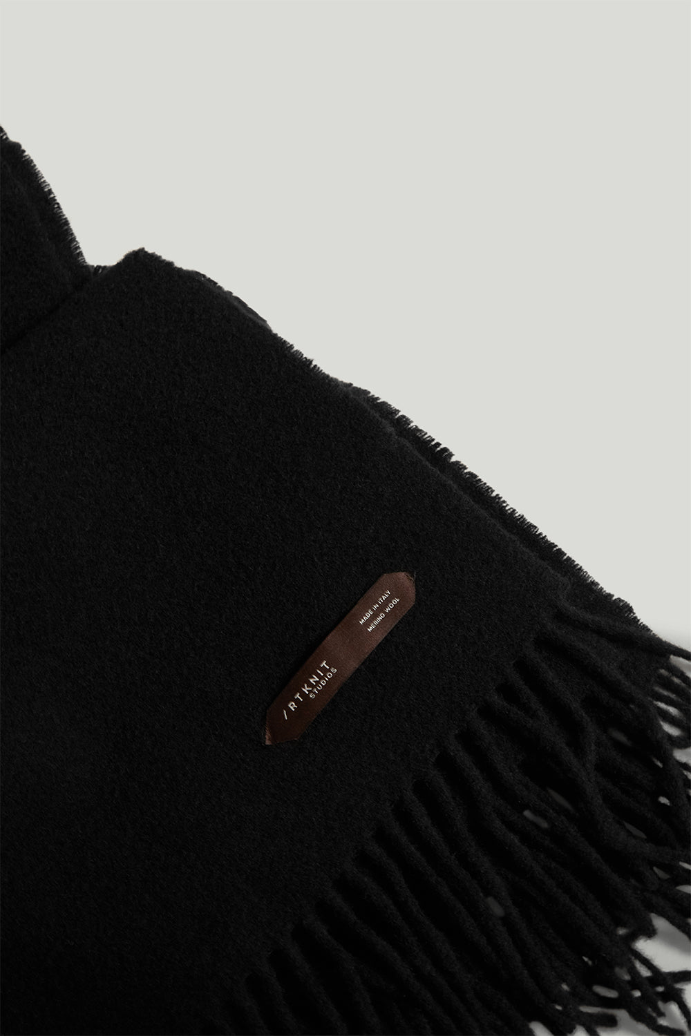 Der Oversize-Wollschal mit Fransen
