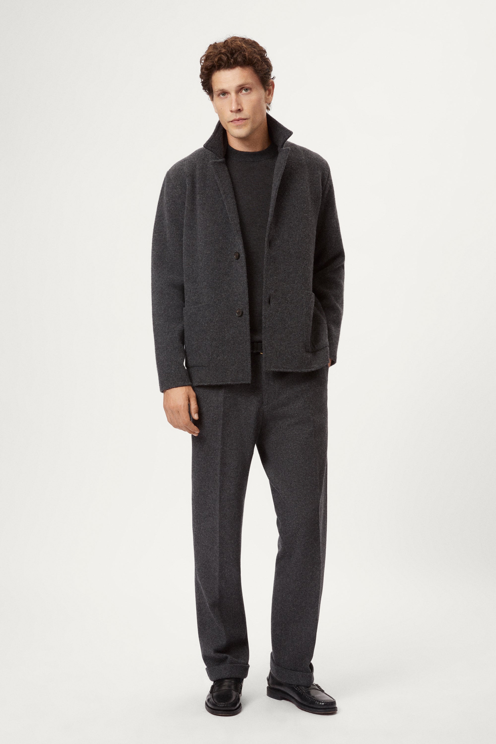 Man wearing a Woolen dark gray Jacket and pants 