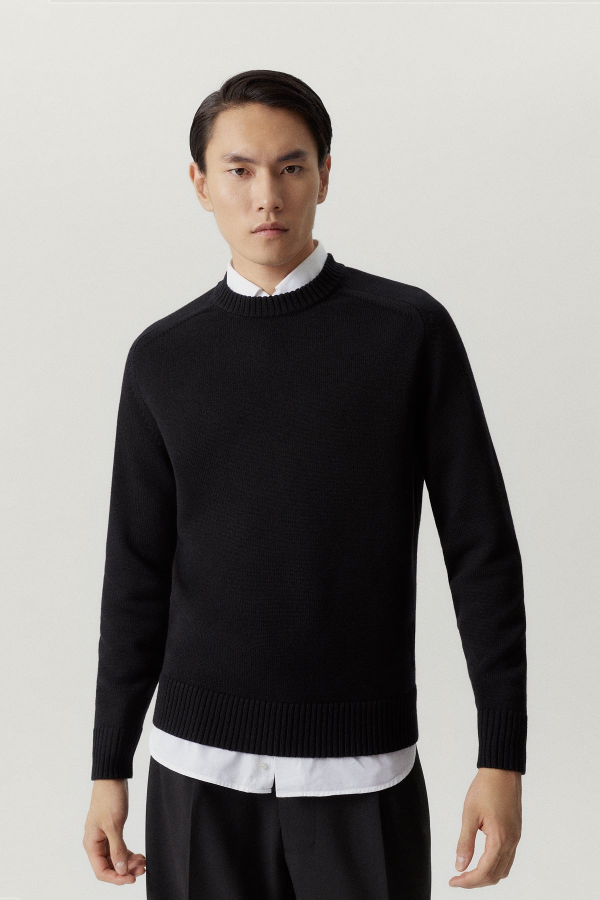 the merino wool saddle shoulder sweater black