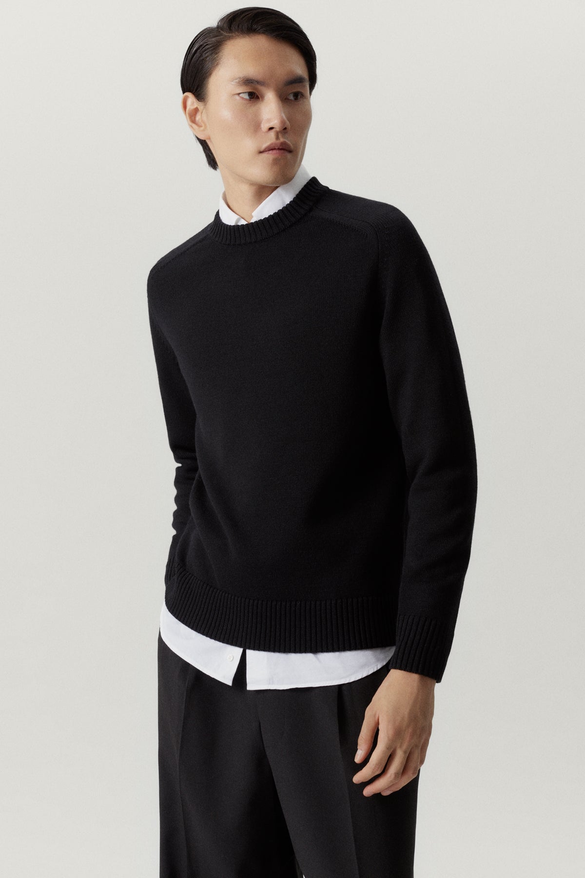 the merino wool saddle shoulder sweater black