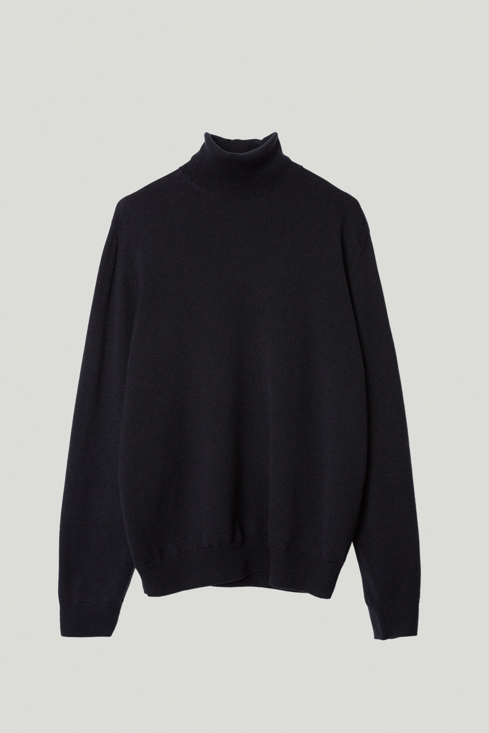 the ultrasoft wool relaxed roll neck midnight blue