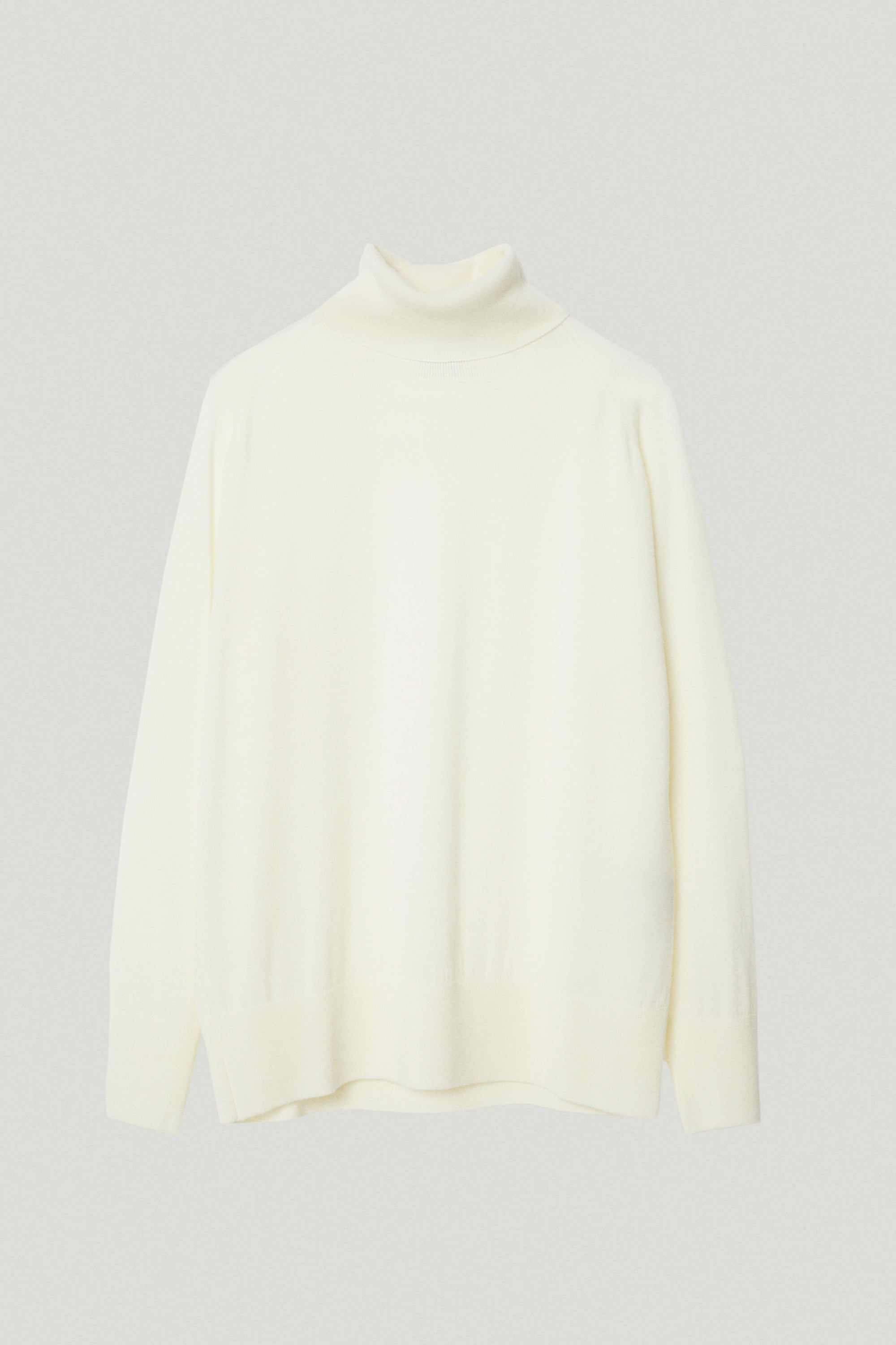 the ultrasoft wool relaxed roll neck natural white