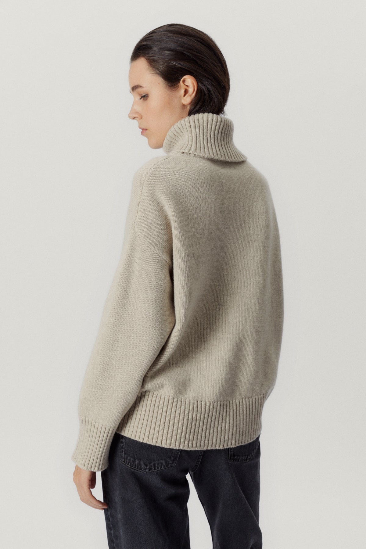 the woolen chunky roll neck ecru