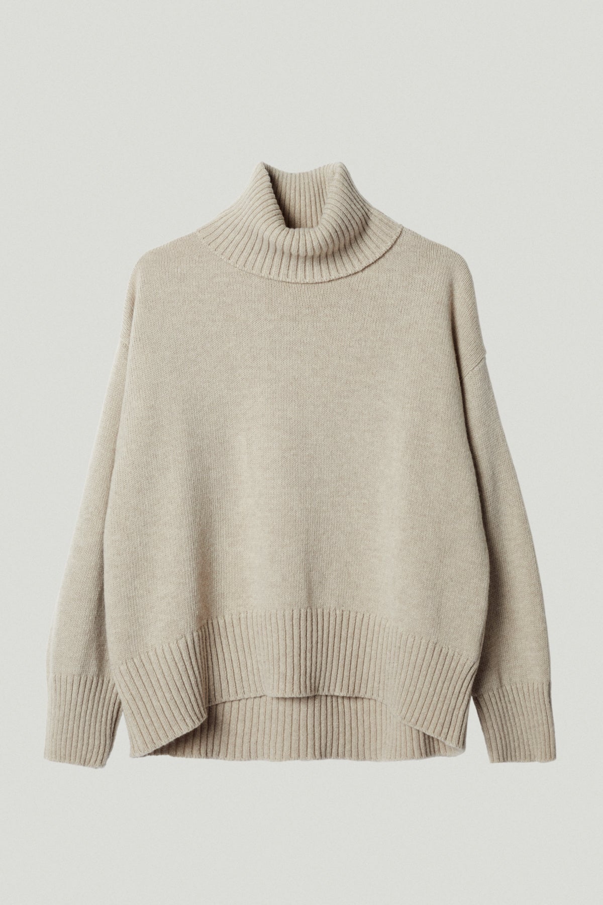 the woolen chunky roll neck ecru