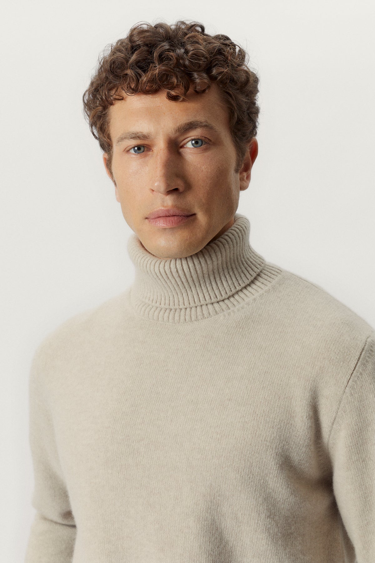 the woolen roll neck ecru